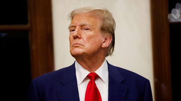 Trump says US to review trade deals, may renegotiate USMCA